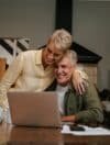 happy caucasian senior couple working from home